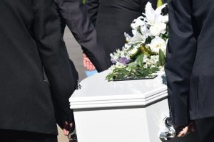 Carrying a coffin at a funeral